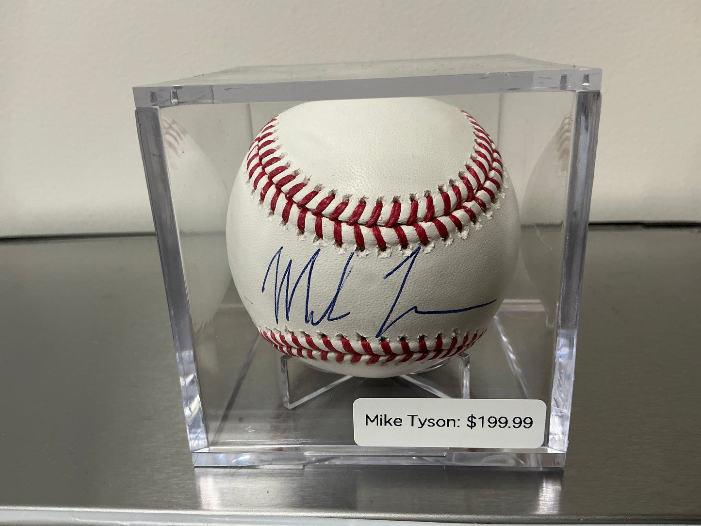 Mike Tyson Autographed Baseball (Beckett COA)