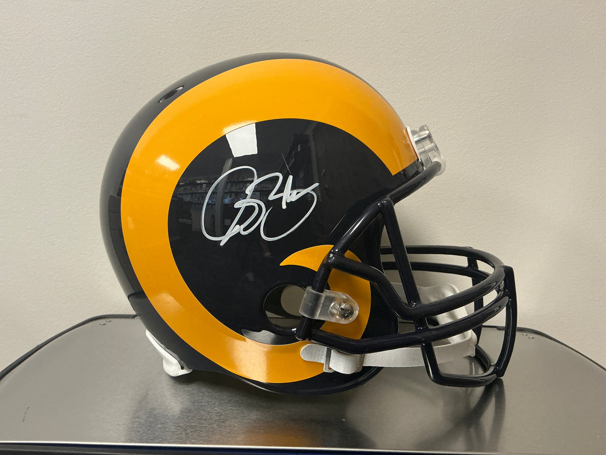 Isaac Bruce Autographed Rams Helmet (Beckett COA)